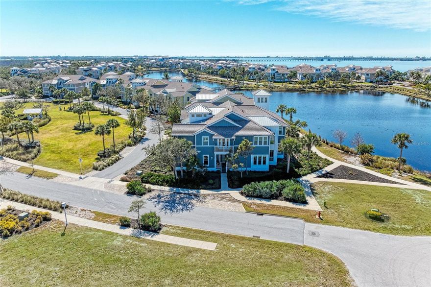 Welcome to your beautiful home with spectacular water views in the luxurious, gated, much
sought after, coastal resort community of Harbour Isle on Anna Maria Sound. This spacious
three bedroom and three bath Abaco style home has exquisite decor and upgrades galore.
(Some furnishings are negotiable.) This light and bright home has expansive water views from
the owner’s suite, sunroom (with wall to ceiling windows), kitchen and living area where you can
experience unparalleled sunsets and views all the way to Tampa Bay and the Sunshine Skyway
Bridge. Focusing on the interior of the property, it features a multitude of upgrades. To name a
few,  Custom Granite Coffee Bar with built-in warming drawer, back lighting and custom hand made handles, New Quartz countertops throughout, 42” solid wood cabinets, updated specialty Granite (Blanco) sink in the Kitchen, updated Laundry room, Dining room custom built in Book Shelve with back lighting, Custom music speakers throughout the home. Custom window treatments including hunter douglas pirouettes and silhouettes, gorgeous tile and wood flooring in main living area, kitchen and bath, upgraded carpet in two bedrooms, stainless steel appliances in the kitchen, custom window treatments, crown molding and an oversized two-car garage. The building has green LEED
certification, block construction with Hardie board exterior siding and PGT impact rated
windows. It is strong and built to last. Harbour Isle is second to none. While inside the gates at
Harbour Isle, explore two miles of neighborhood walking trails and stroll to the nearby
neighborhood pools with outdoor grills, cabanas, fire pit and kayak launch for the 38-acre lake.
End the day with an incredible sunset at the 23,000 square foot Beach Club overlooking Anna
Maria Sound. The Beach Club features resort-style amenities with the Sky Bar, Lounge,
Pavilion, Fitness Center, Yoga Lawn, Event Lawn, resort pool, hot tub and a private beach to
launch a kayak in the Sound. Just outside the gates of Harbour Isle you’ll find the Margaritaville
inspired Compass Hotel, Safe Harbor Marina with wet and dry storage and Floridays waterfront
tiki restaurant. Cross the Manatee Bridge and you’re on Anna Maria Island with its sugar sand
beaches and quaint island charm. It’s time to start living your best life. Live, relax, enjoy an
active lifestyle in award-winning Harbour Isle. This home is special!