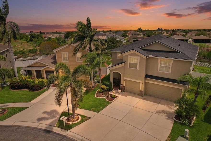 Welcome to this spacious and beautifully updated home in the gated community of Mira Lago! Meticulously maintained, this home offers over 3,200 square feet of thoughtfully designed living space.

Situated on a unique oversized lot overlooking a peaceful conservation area, this property delivers privacy and serene views. A covered lanai with an extended paver patio creates the perfect setting for outdoor living and entertaining, while a hurricane-impact sliding glass door enhances both safety and indoor-outdoor flow.

Inside, the home features a functional and versatile layout with 6 bedrooms and 4 full bathrooms, including a first-floor bedroom with an adjacent full bath—ideal for guests or a private in-law suite. Formal living and dining rooms offer flexible space for entertaining, while the main living area opens seamlessly to the kitchen.

The updated kitchen has been beautifully remodeled with quartz countertops, stainless steel appliances, a large island with breakfast bar, white cabinetry with crown molding, a closet pantry, and glass tile backsplash. Luxury vinyl plank flooring runs throughout the main living areas, offering both durability and style.

Upstairs, a spacious loft provides additional living space—perfect for a media room, playroom, or home office. The primary suite is generously sized, featuring a separate sitting area, a large walk-in closet, and an ensuite bath with granite countertops, dual vanities, a garden tub, and a separate walk-in shower. Secondary bedrooms are all well-sized with large closets and ceiling fans, and the upstairs laundry room includes a utility sink for added convenience.

Additional highlights include a 3-car garage, NEW ROOF and NEW A/C, providing peace of mind for years to come.

Mira Lago is a private, gated community offering a resort-style pool, playground, and basketball court—all just minutes from local beaches, boat launches, shopping, and dining. Convenient access to US-41 and I-75 - Tampa, St. Petersburg and Sarasota.

This is a rare opportunity to own a move-in ready home with space, upgrades, and an unbeatable location. Schedule your private showing today!