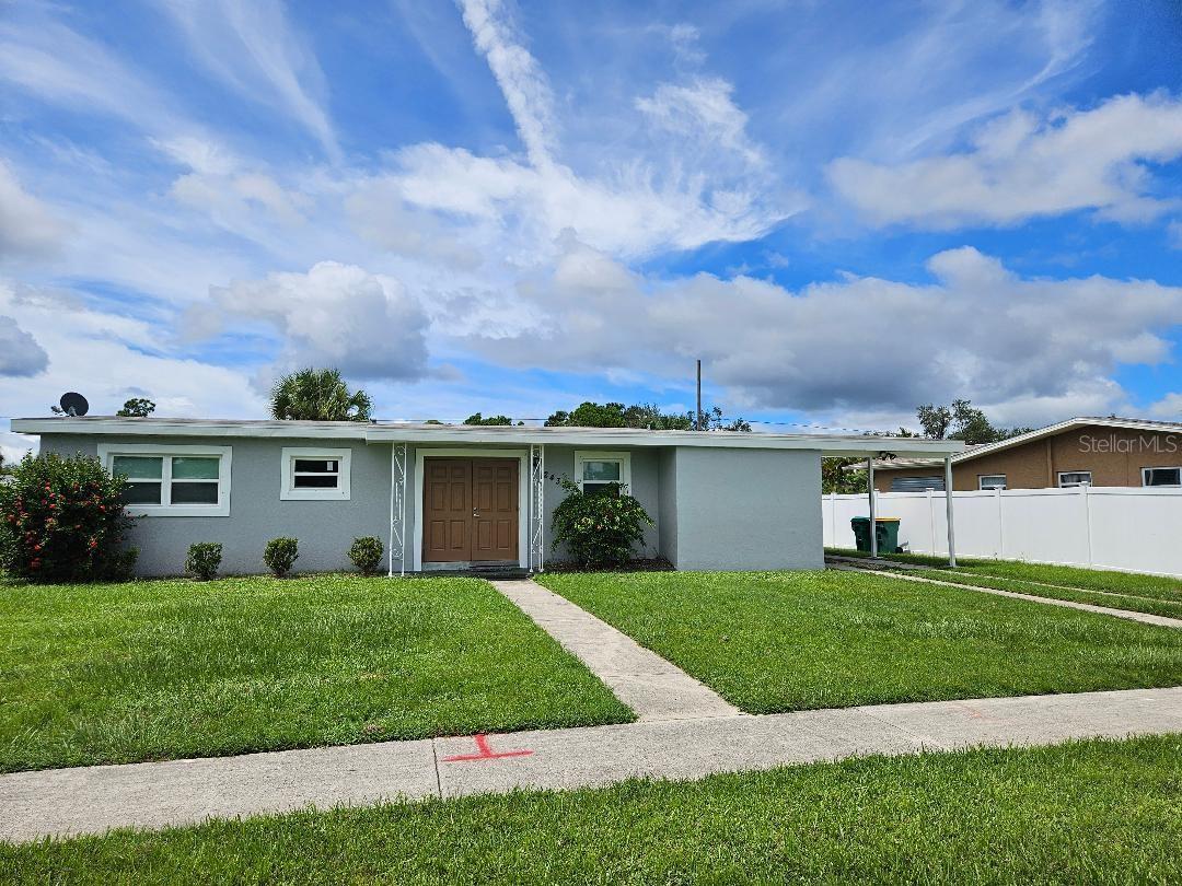 Welcome to this Charming 2 Bedroom Home in Heart of Port Charlotte! Double Door Entry leads you into Large and Bright Open Living Room and Dining Room. Kitchen has lots of cabinets and pass thru window. Tile flooring throughout, Newer Windows and Interior and Exterior Doors. Nicely Updated Bathroom with Walk In Shower. Both Bedrooms have Ceiling Fans. Sliders Leading to Backyard. Perfect for a Barbeque or Gardening. Enjoy Florida year-round living with the Screened Lanai off Kitchen and Dining Room. Covered Carport and Additional Parking Space is Available. Laundry Room with Newer Washer and Dryer. New Duct Work and Insulation in Attic. Public Water and Sewer, No HOA. Conveniently located to Shopping, Medical Facilities, Beaches, Parks, Dining, Sports Stadium, Boating, Golfing and More!