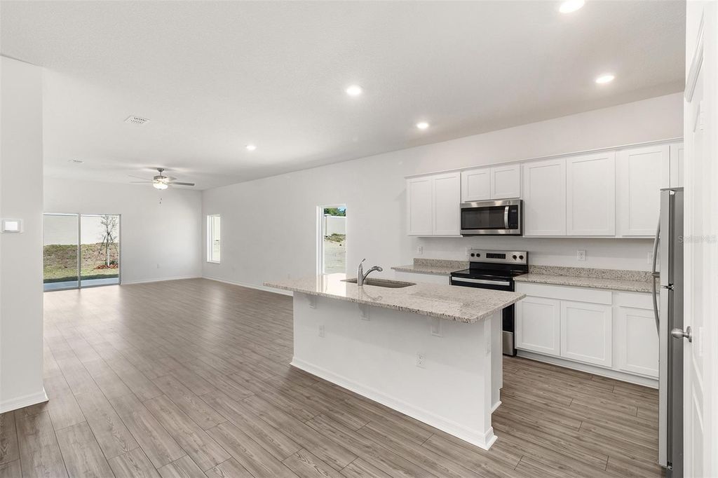 Photo of 1633 Nantucket Way, Winter Haven, FL 33884 (MLS # TB8476372)