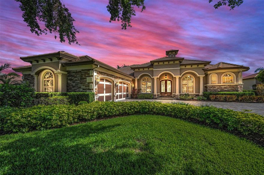 Welcome to your Luxury Dream Home! A unique opportunity to own one of the few custom-built Campagna homes in Champions Club. This luxurious Mediterranean pool home is perfectly positioned on a premier homesite, offering breathtaking views of the Fox Hollow Golf Course and a serene lake. With nearly 5,000 SF of elegantly designed living space, this residence features 4 spacious bedrooms, a dedicated den/office, 4 full and 1 half well-appointed bathrooms, multiple living areas including a grand great room, formal dining area and an open floor plan ideal for hosting gatherings. Step inside to discover a masterpiece of architectural design with exquisite details of tray and barrel ceilings, crown molding and wood beams, wood and tile flooring, and 2 cozy fireplaces. There is huge upstairs versatile bonus/media room with wet bar and private balcony. This room is sound proof with gypcrete composite under the flooring and a mass loaded vinyl sound barrier plus batting insulation for maximum enjoyment. The gourmet kitchen is a chef’s delight with upgraded stainless-steel appliances, 6 burner gas range, premium cabinets, and granite countertops. The oversized owner’s suite is a true retreat, featuring two custom walk-in closets with Southern Closet System Design, dual sinks with granite countertops, a walk-in tiled shower, and a luxurious garden tub. Each of the three additional guest bedrooms offer ample space and walk-in closets. Entertain in style with an outdoor oasis that includes a sparkling pebble-tech pool with a spa, pavered lanai, and a fully equipped outdoor kitchen. The property is enhanced with upgraded landscaping and outdoor lighting, creating a perfect ambiance for both relaxation and entertaining. Additional features include 15 KW House Generator, newer appliances, reverse osmosis water system,  solid wood doors, an oversized 3-plus car garage and so much more. Too many upgrades/details to list – but available upon request. Enjoy the benefits of living in Champions Club, a private, gated community with exclusive amenities including a clubhouse, tennis courts, a fitness center, and a resort-style pool & spa. Conveniently located near shopping, top-rated schools, dining, medical facilities, and expressways to Tampa. This exceptional home is a rare find and must-see. Schedule your private showing today to experience the unparalleled luxury and sophistication of this Champions Club residence!