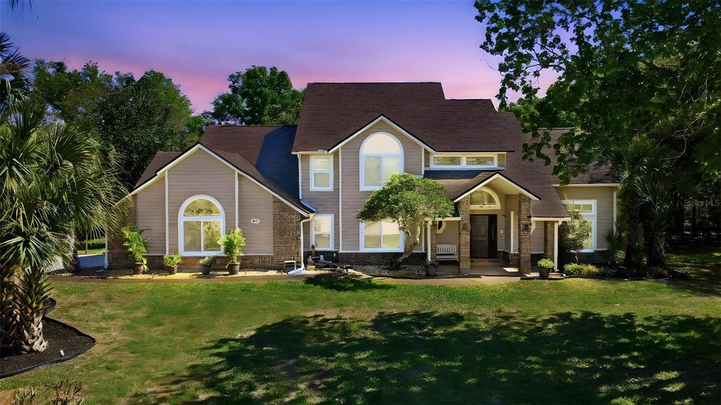 Photo of 69 Spring Lake Drive, Debary, FL 32713 (MLS # V4948100)