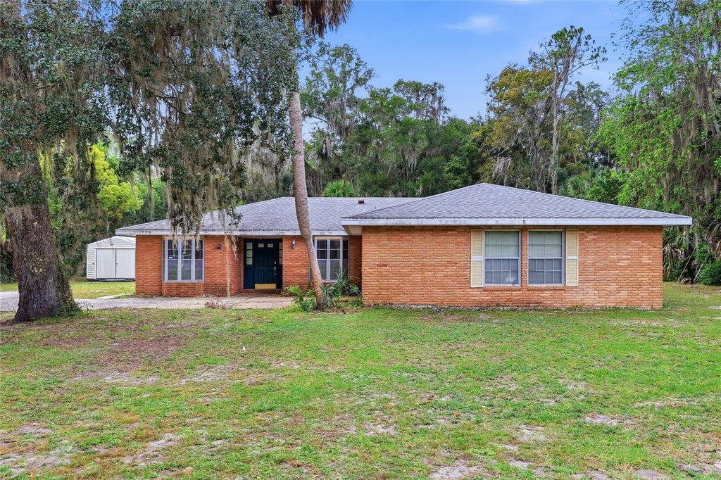 Photo of 6710 SW 13th Street, Gainesville, FL 32608 (MLS # GC544565)