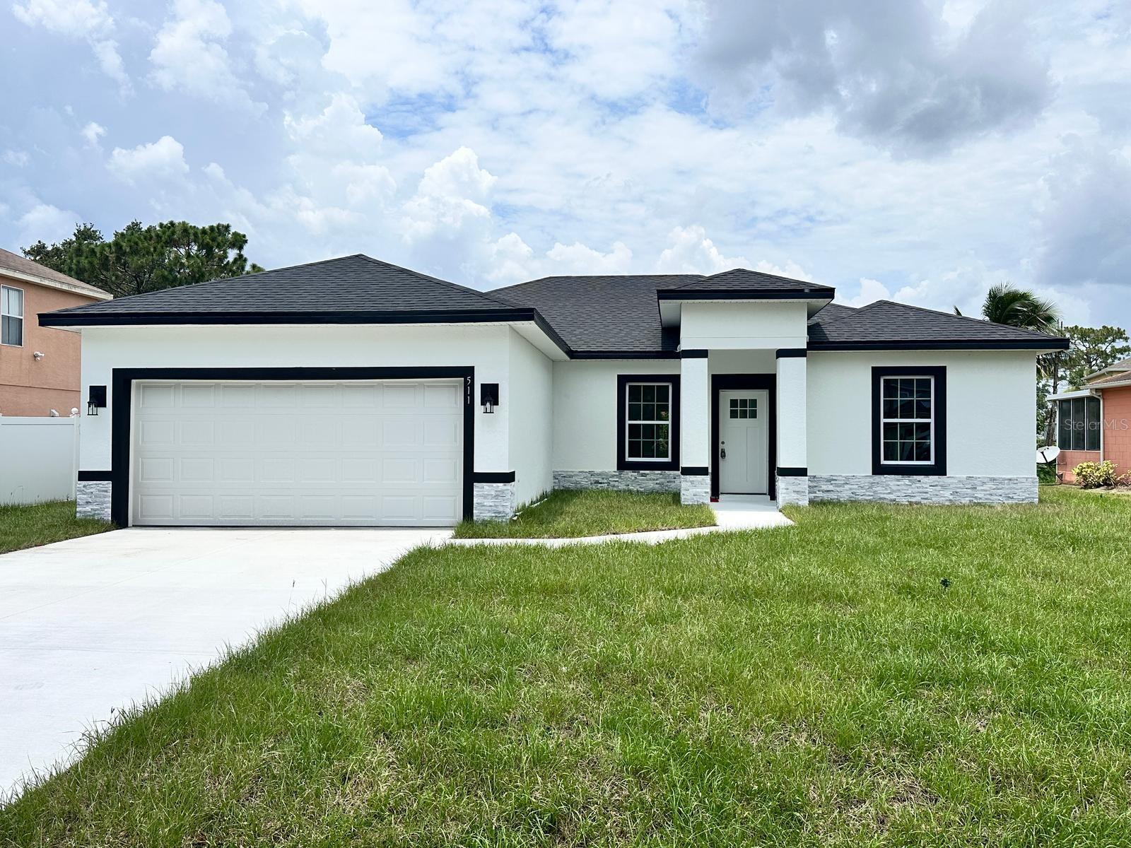 Under Construction. New, modern, and charming home – Take advantage of this unique opportunity!
We present this newly built residence that combines charm, comfort, and functionality in every detail. Right at the entrance, the welcoming porch invites relaxation, while the surrounding garden brings freshness and beauty to the space.
With a contemporary design and open concept, the property features 4 spacious and bright bedrooms, as well as 3 elegant bathrooms, all with sophisticated and high-end finishes. The spacious living room connects to the backyard through large sliding doors, favoring the entry of natural light and creating a bright and airy atmosphere.
The refined details and high-quality vinyl flooring reinforce the home's modern and welcoming style. All bedrooms have built-in closets, promoting organization and practicality for daily routines. The bathrooms combine beauty and functionality, with modern sinks and custom cabinetry.
The kitchen is a standout feature, practical and elegant, equipped with quartz countertops and essential appliances, ideal for those who value practicality combined with good taste. The laundry room is ready for use, ready to receive your appliances and make daily life easier.
As a special feature, the property comes with a one-year builder's warranty, offering the new owner added peace of mind. The two-car garage has an automatic gate, ensuring security and convenience.
Located in a prime growing area, the house is close to a variety of shopping, leisure, and service options.
Don't miss this opportunity!
Schedule your visit and discover the ideal place to live with quality, style, and comfort.