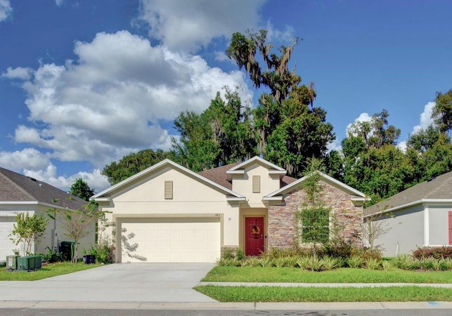 Grab this almost new house before it is gone. This 2020 Maronda built home has many upgrades and backs up to a conservation area. Offering four bedrooms, two bathrooms, two-car garage with an enclosed porch. Entertain in your open kitchen with 42' cabinets, granite countertops, stainless steel appliances, and a breakfast bar. The house has beautiful wood plank tile running through the main areas of the house. The split plan offers privacy for the main bedroom with a large closet, bathroom with dual sinks, garden tub, and separate stall shower. Enjoy many Florida days on your enclosed screened porch with a spa. Minutes from Downtown Deland, Stetson, shopping, and medical. Deland is centrally located between the beaches and Orlando. Don't miss this one!