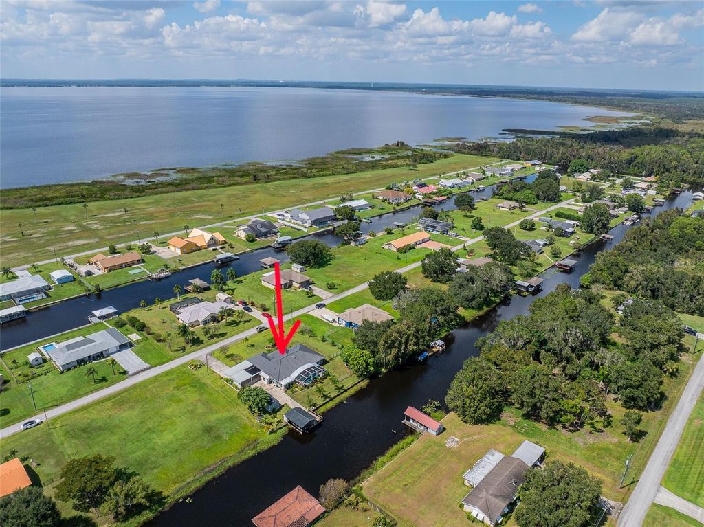Photo of 6309 Avocado Dr, Indian Lake Estates, FL 33855 (MLS # L4956254)