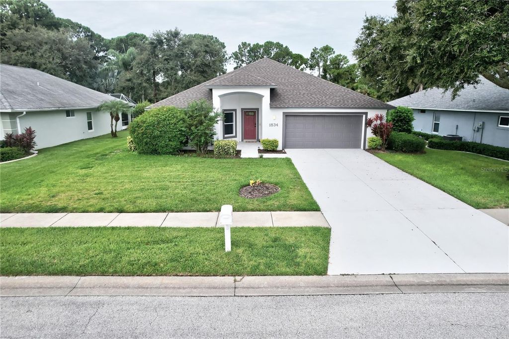 Photo of 1834 Turnbull Lakes Drive, New Smyrna Beach, FL 32168 (MLS # NS1085364)