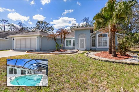 Photo of 212 Wellington Drive, Palm Coast, FL 32164 (MLS # FC316641)