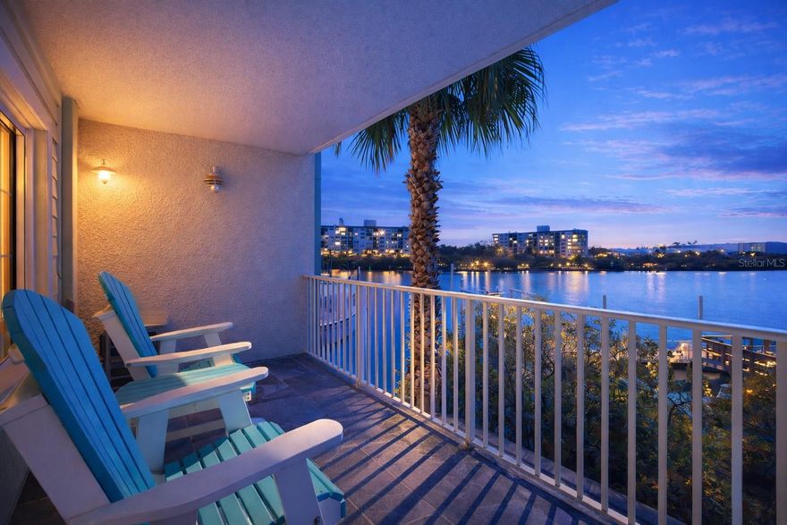 2BR/2BA elevated waterfront condo at Harbourside at Marker 33 in Indian Rocks Beach. 3-night rentals allowed. Turnkey 1031 exchange ready. This 2 bedroom, 2 bathroom elevated waterfront condo in Indian Rocks Beach offers 1,110 square feet of interior space and was built in 2016. Approved for short-term rentals with a 3-night minimum and 120-night maximum lease period, the property supports personal use, rental income, or a 1031 exchange strategy. Financing is available. Positioned directly on the Intracoastal Waterway and two blocks from the Gulf beaches, the building is in a flood zone but was constructed in 2016 to a higher elevation and hurricane standards, including hurricane-rated windows. This second-floor unit faces south with water views to the east and west. The 23-foot-wide private balcony overlooks the Intracoastal and nearby boat slips in a designated no-wake zone. The split floor plan allows flexibility for guest stays or dual-use occupancy. Theprimary suite includes a king bed and a walk-in shower. The second suite features two queen beds and a full bath. The open kitchen offers granite counters, shaker cabinetry, luxury vinyl plank flooring, and a breakfast bar that flows into the living area. Washer and dryer (2022) are included. The unit comes fully furnished with decor, televisions, linens, dishware, appliances, and beach gear, allowing immediate rental or personal use withoutadditional setup. Elevator access serves this elevated building. Open parking is located under the structure, and each unit receives one parking pass. WiFi is included. One pet up to 20 pounds is permitted for owners. The HOA fee is $1,660 per month and includes cable TV, internet, WiFi, water, sewer, trash, flood and building insurance, escrow reserves fund, common area taxes, exterior and grounds maintenance, repairs, pest control, pool maintenance, recreational facilities, community pool, These Owners are able to transfer four daily passes (while most units only have two.) to Splash Harbour Waterpark, featuring a 600-foot lazy river, two 42-foot water slides, a kid's zone with slides and a dumping bucket, a resort-style pool, food service, full-service tiki bar, and sundecks overlooking the Gulf of Mexico and the Intercoastal. Rooftop terraces provide additional areas for viewing sunrises and sunsets. From Harbourside at Marker 33, at least ten restaurants and eateries are located within four blocks, including Jimmy Guana’s, The Original Crabby Bill’s, Villa Gallace, Monstah Lobstah, and JD’s Back Porch, Guilty SeaSports Pub, and P.J.’s Oyster Bar, along with nearby shopping. The area is golf cart-friendly and walkable. Clearwater Beach is approximately 7 miles away, Downtown St. Petersburg is approximately 21 miles away, Tampa International Airport is approximately 25 miles away, and Walt Disney World is approximately 91 miles away.