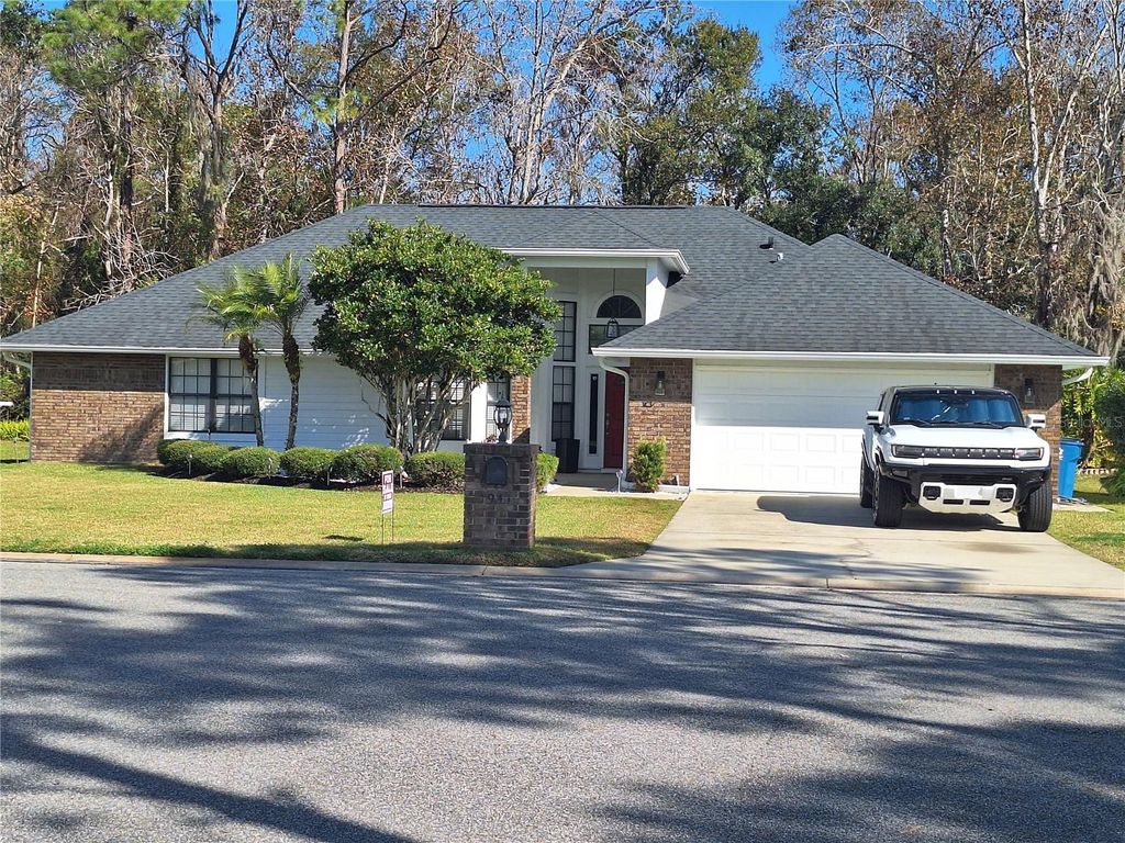 Photo of 1941 Spruce Creek Landing, Port Orange, FL 32128 (MLS # O6372211)