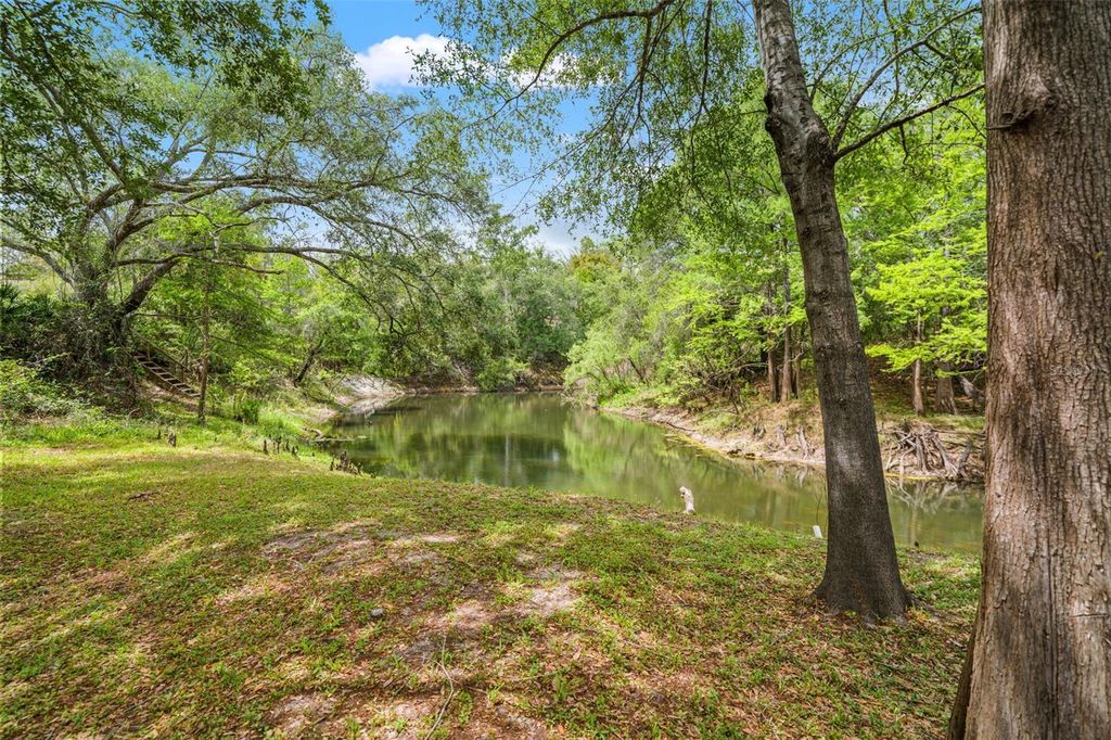 Photo of 33013 Round Table Road, Ridge Manor, FL 33523 (MLS # TB8495003)