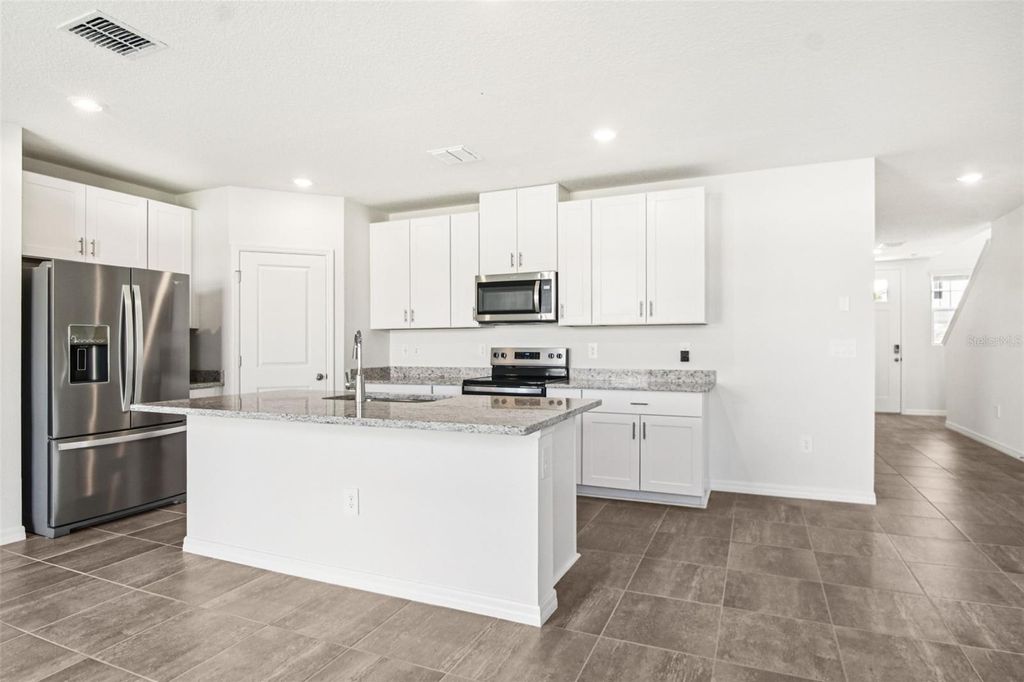 Photo of 1844 Brekey Way, Zephyrhills, FL 33541 (MLS # O6318755)