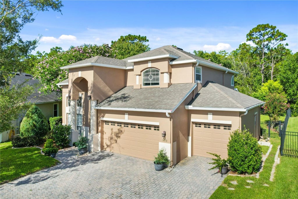 Photo of 1473 Amaryllis Circle, Orlando, FL 32825 (MLS # O6427311)