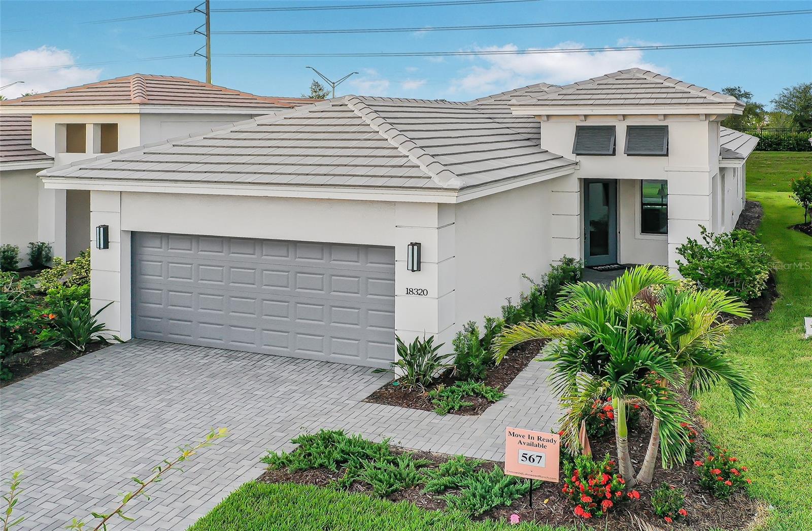 **New Contruction** This beautifully designed Lido floorplan, a single-story home, offers a blend of sophistication and functionality with 2 Bedrooms, 2 Bathrooms, and a versatile Den enclosed by double doors. Nestled within a gated community and positioned on a homesite with no neighbors behind, this residence offers both privacy and tranquility. Its eastern exposure allows you to enjoy peaceful sunrises from the comfort of the lanai, that has a gas stub for future outdoor kitchen. Inside, the open-concept layout creates a natural flow between the kitchen, great room, and covered lanai, making it an inviting space for both entertaining and relaxed daily living. With upgraded cabinets and quartz countertops in both the kitchen and bathrooms, GE appliances, and tile flooring throughout, every detail reflects thoughtful craftsmanship. A tub-to-shower conversion adds convenience, while tray ceilings lend elegance and vertical depth to the home’s interior.
