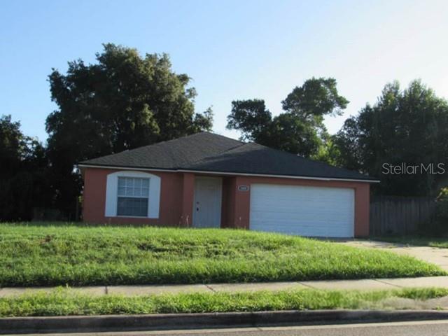 Photo of 1009 Fort Smith Boulevard, Deltona, FL 32725 (MLS # O6447560)