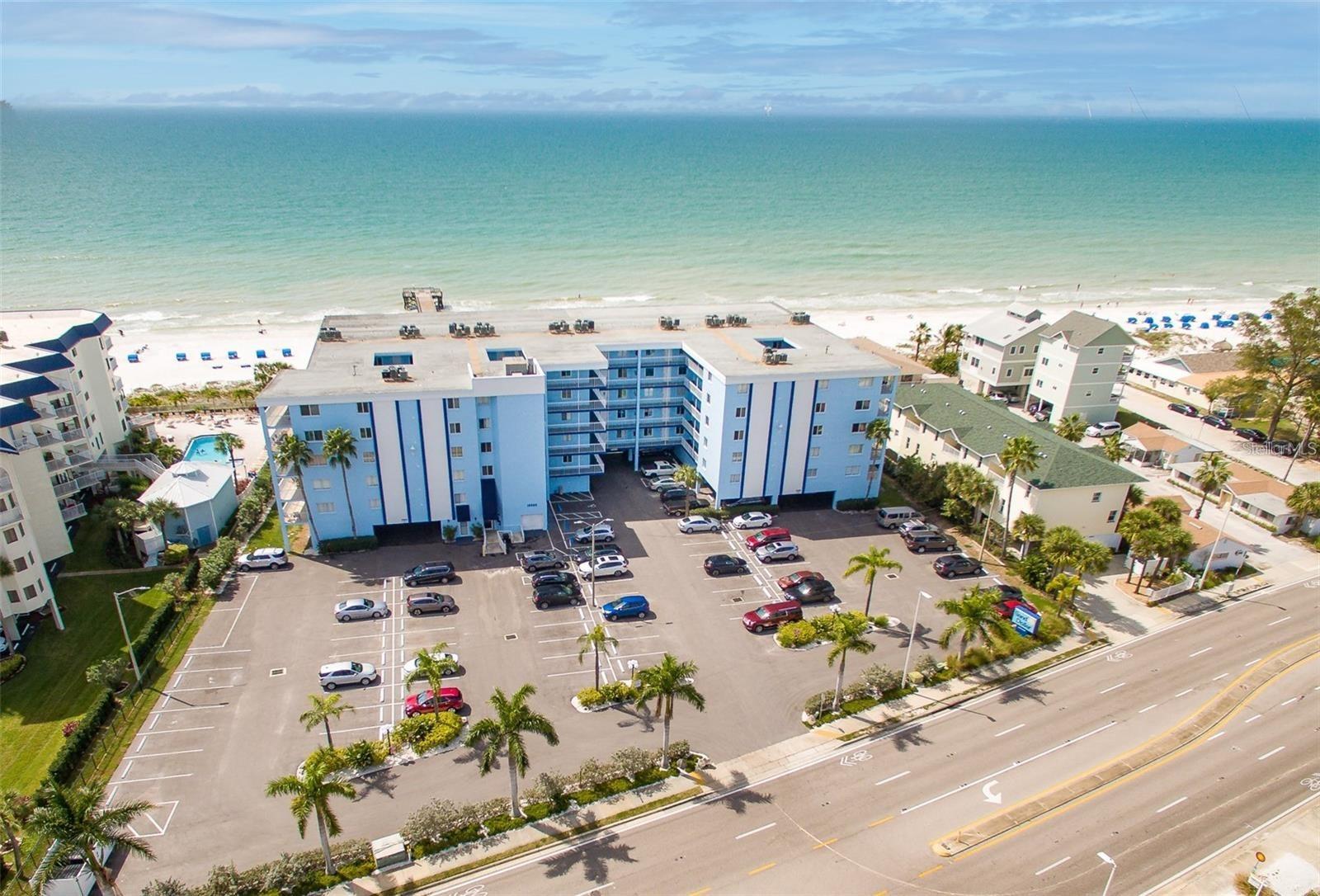 RARE OPPORTUNITY! Come enjoy the beach life in this TOP FLOOR 3 bedroom - 2 bath condo with direct Gulf Front Balcony overlooking our gentle Gulf Waters & sugar sand beach. This is one of the most sought-after vacation rental properties! The spacious living area is tastefully decorated with a beachy vibe. Beautifully updated kitchen with lots of cabinetry and granite counters. Updated bathrooms, Master bathroom has roll-in shower. Large bedrooms with walk-in closets and utility room with full size side by side washer/dryer in unit all add to its appeal.
Photos coming Tuesday
Property boasts a geo-thermal heated, salt water pool and jacuzzi with all new pavers, fencing, furniture and thatched covered tiki huts and garden area with 4 barbecue grills. Great rental income in popular weekly rental beach resort with experienced, on-site rental management...rental history available upon request. Don't miss this opportunity to own one of the best buys on the Beach!!!! Sand Dollar is conveniently located, minutes away from St. Pete and Clearwater Beaches, great restaurants, shopping, golfing, attractions and sports events. Easy access To Tampa and 2 airports (PIE and TPA).