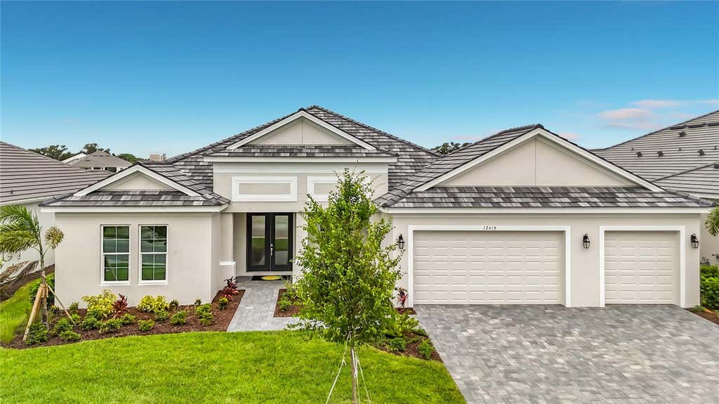Photo of 12418 Stonegate Trail, Parrish, FL 34219 (MLS # A4698340)