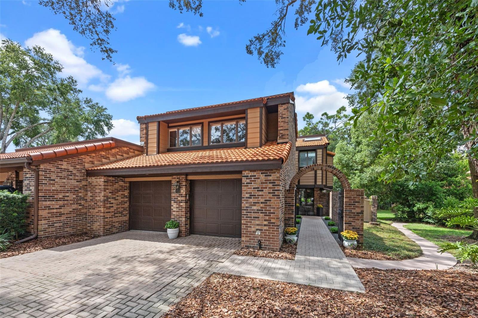 Welcome to a very rare opportunity in The Springs! This renovated 5-bed, 3-bath home offers 3,785 square feet of living space and is nestled on one of the very best locations in Whispering Pines. A private courtyard with a brick paver walkway leads you to the front door of this handsome red brick townhome. Upon entering, you will be greeted by an abundance of natural light and gorgeous porcelain tile floors that run throughout the first floor. The spacious kitchen is an entertainer's dream with lovely white soft-close cabinets, stainless steel appliances (note the double ovens) tile backsplash, and scrumptious granite that perfectly complements the decor. You will appreciate the generous cabinets that provide extra storage. French doors lead to the side patio and yard, the perfect place for grilling. The kitchen is truly the heart of the home, opening to a large dining room and great room, ideal for dinner parties and holiday get-togethers. French doors open from the great Room to the Florida Room, giving you another sizable living space. The Florida room overlooks the large double deck, giving you an amazing outdoor living space….and the best part… open your gate and you are only 12 steps to the Whispering Pines pool and tennis court! Note: Whispering Pines is an enclave of only 69 homes. Before going upstairs, be sure to check out the downstairs bedroom and bath, which makes a perfect spot for overnight guests or a home office. Upstairs, you will find the primary suite offering a luxurious bath with a huge walk-in shower for two! In addition, three nice-sized bedrooms and a lovely bathroom complete the second floor. The current owner completely remodeled the home in 2016. Some recent improvements include: refrigerator (2025) shed (2024) front door (2025) washer and dryer (2025)
The Springs is a private man-gated community in a top-rated school zone, conveniently located near shopping, restaurants, and highways. Once you enter through the gate, you will find yourself in a nature lover's paradise offering its residents unique amenities. The centerpiece is the crystal clear natural spring with beach access. In addition, enjoy nature trails, tennis courts, basketball court, swimming pool, fitness center, a playground, picnic and barbecue area, horse stables, and RV and boat storage. Enjoy fun activities like Friday night food trucks, movie nights, and the annual Philharmonic concert under the stars. Tour today and you will understand why this is an incredible opportunity not to be missed!