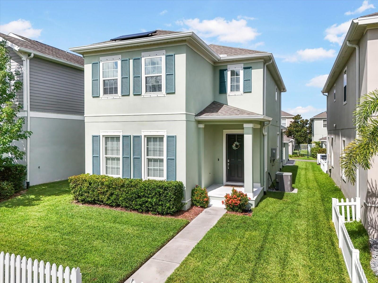 ***Solar Panels (TECO bills are under $60/month!), trash and recycling pickup, pest control, lawn care, quarterly professional cleanings, and amenities are included!*** Experience the charm, convenience, and community of Winthrop Village in this beautifully appointed Taylor Morrison Ashland model. Ideally positioned on a picturesque green space and framed by a classic white picket fence, this home embodies the best of Traditional Neighborhood Design—walkable streets, inviting porches, and a vibrant town center—all created by the same visionary town planner behind Seaside, Rosemary Beach, and Celebration. Step inside to find an open, light-filled interior with high ceilings, wood-look tile floors throughout the main living areas, a stylish built in mud room space, and a striking wood-tread staircase with iron railing. The chef’s kitchen boasts sleek quartz countertops, 42-inch wood cabinetry, stainless steel appliances, and a natural gas cooktop, perfect for entertaining. This energy-efficient home also features a tankless gas water heater, gas dryer, and solar panels to help reduce utility costs. Upstairs, the primary suite offers a serene retreat with a custom wood closet and a spa-like en suite bath. Two additional bedrooms, a second full bathroom, and laundry room provide flexibility and comfort for family and guests. Outdoor living is equally inviting with a covered front porch overlooking the green space and a private pavered courtyard ideal for gatherings. A rear-facing two-car garage, accessible via a private alleyway, keeps the curb appeal pristine. Living here means enjoying the Winthrop Village lifestyle—a natural gas community with resort-style amenities including a heated pool, spa, fitness center, playground, dog park, and scenic walking trails. Residents benefit from regularly scheduled neighborhood clubs, seasonal events, and exclusive discounts at Winthrop Town Centre favorites like Cappy's, Donovan's, and Acropolis Greek Taverna. Education is top-tier, with two preschools, two elementary schools, a middle school, and a college campus all within the community. Winthrop Charter School is—and has always been—A-rated, making it one of the most sought-after public schools in the region. Located under 20 minutes to Downtown Tampa, this home also offers quick access to I-75, US-301, the Selmon Expressway, and I-4 for an easy commute throughout West Central Florida. Rent includes amenity access, solar panels, pest control, lawn treatments, and trash pickup, allowing you to enjoy a low-maintenance, high-quality lifestyle. Don’t miss the opportunity to lease this exceptional Winthrop Village home—where timeless design meets modern luxury. Contact us today for a private tour.