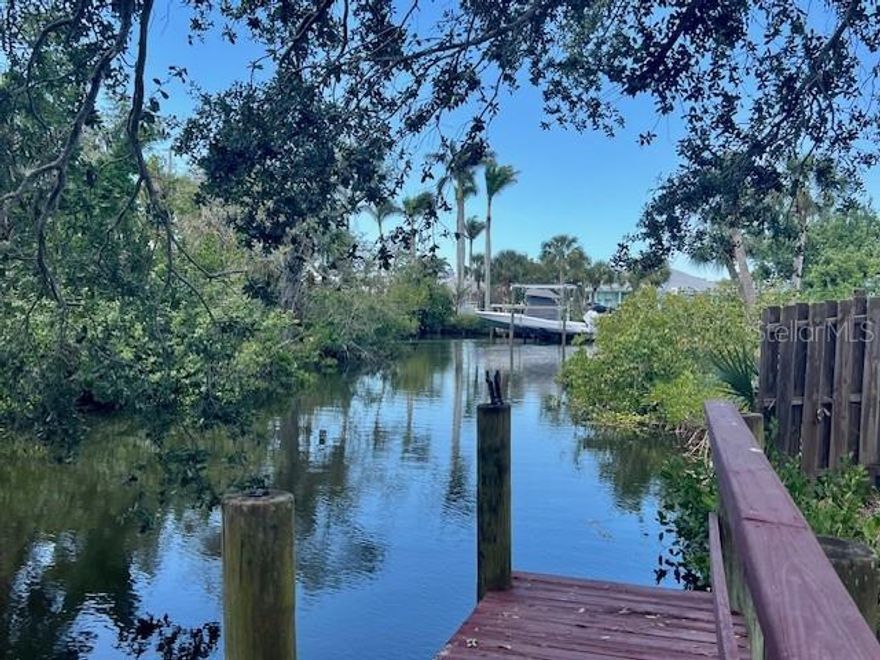 Waterfront Gem! Come see this impressive building lot, complete with existing power, and water. The property is served by an older septic system, which may require replacement. This lot is situated on the Shakett Creek. The Shakett creek leads out to the Gulf that offers fishing, islands for sunbathing and much more. The lot is only minutes from Nokomis Beach, North Jetty Beach, Venice Inlet, and Venice Beach. Kayaking, boating and fishing surrounds this place. Lots of birds, crabs, fish and manatees can be seen from the dock that is located on the property. Nearby is the popular Legacy Trail for bicycling that offers 23.2 miles down an old Seaboard Railroad that accesses various parks and attractions. This lot is located only minutes away from the Gulf, shopping, dining and entertainment at some of the popular places around.
