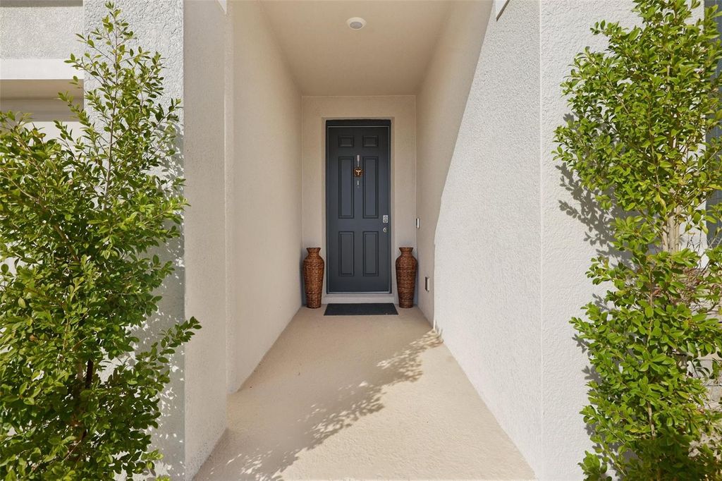 Photo of 10509 Bridgegate Heights Loop, San Antonio, FL 33576 (MLS # TB8454693)