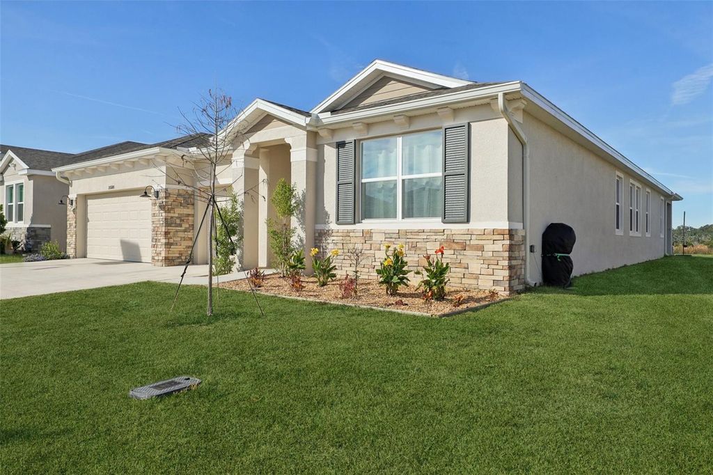 Photo of 10509 Bridgegate Heights Loop, San Antonio, FL 33576 (MLS # TB8454693)