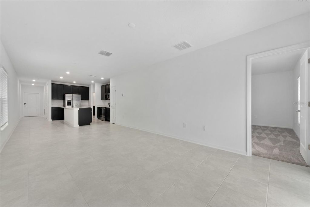 Photo of 2205 Aquifer Lane, Davenport, FL 33837 (MLS # O6409480)