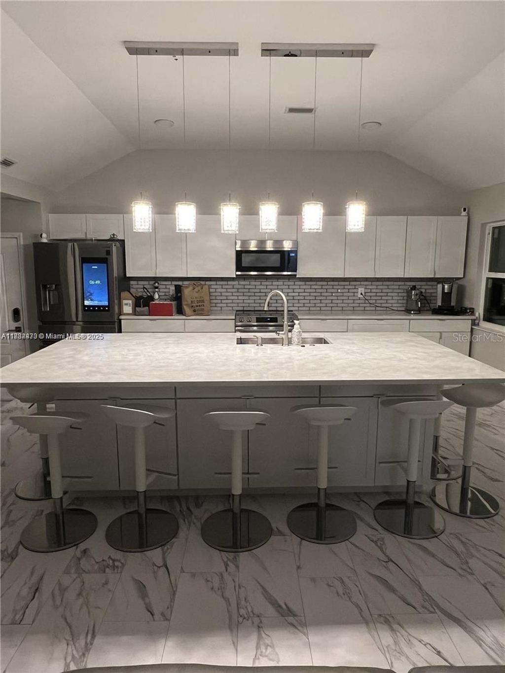 Photo of 310 S 3rd Street, Haines City, FL 33844 (MLS # S5138494)