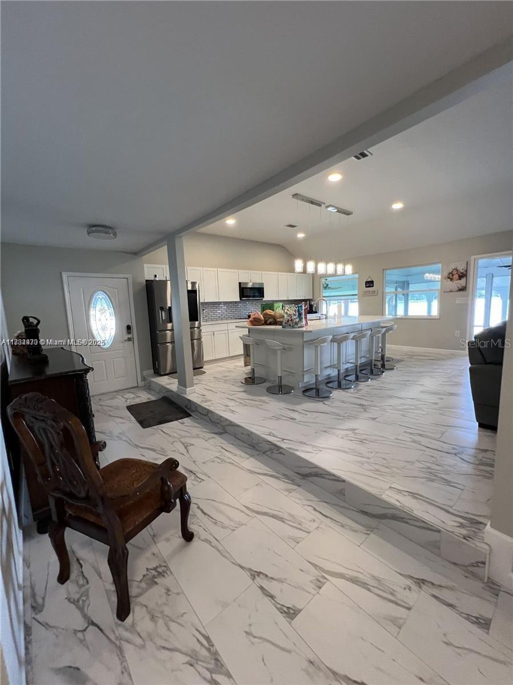 Photo of 310 S 3rd Street, Haines City, FL 33844 (MLS # S5138494)