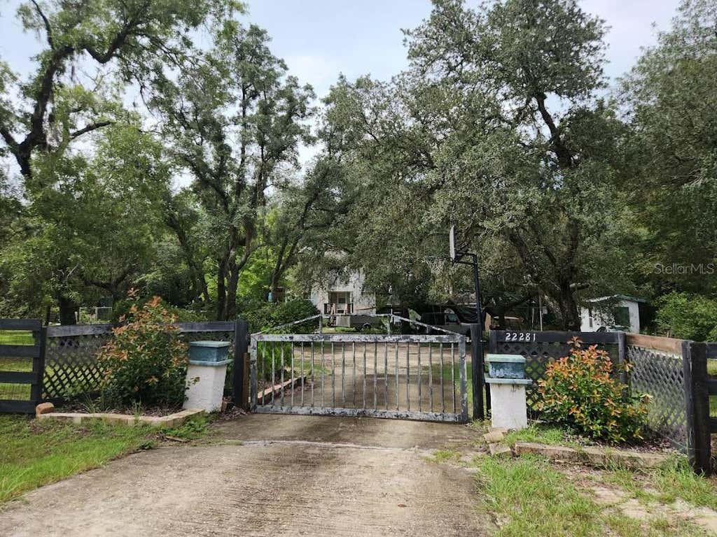 Photo of 27 SW Pine Bluffs Road, Dunnellon, FL 34431 (MLS # OM706808)