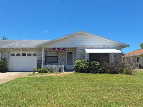 Photo of 419 Falcon Avenue, Edgewater, FL 32141 (MLS # NS1088613)