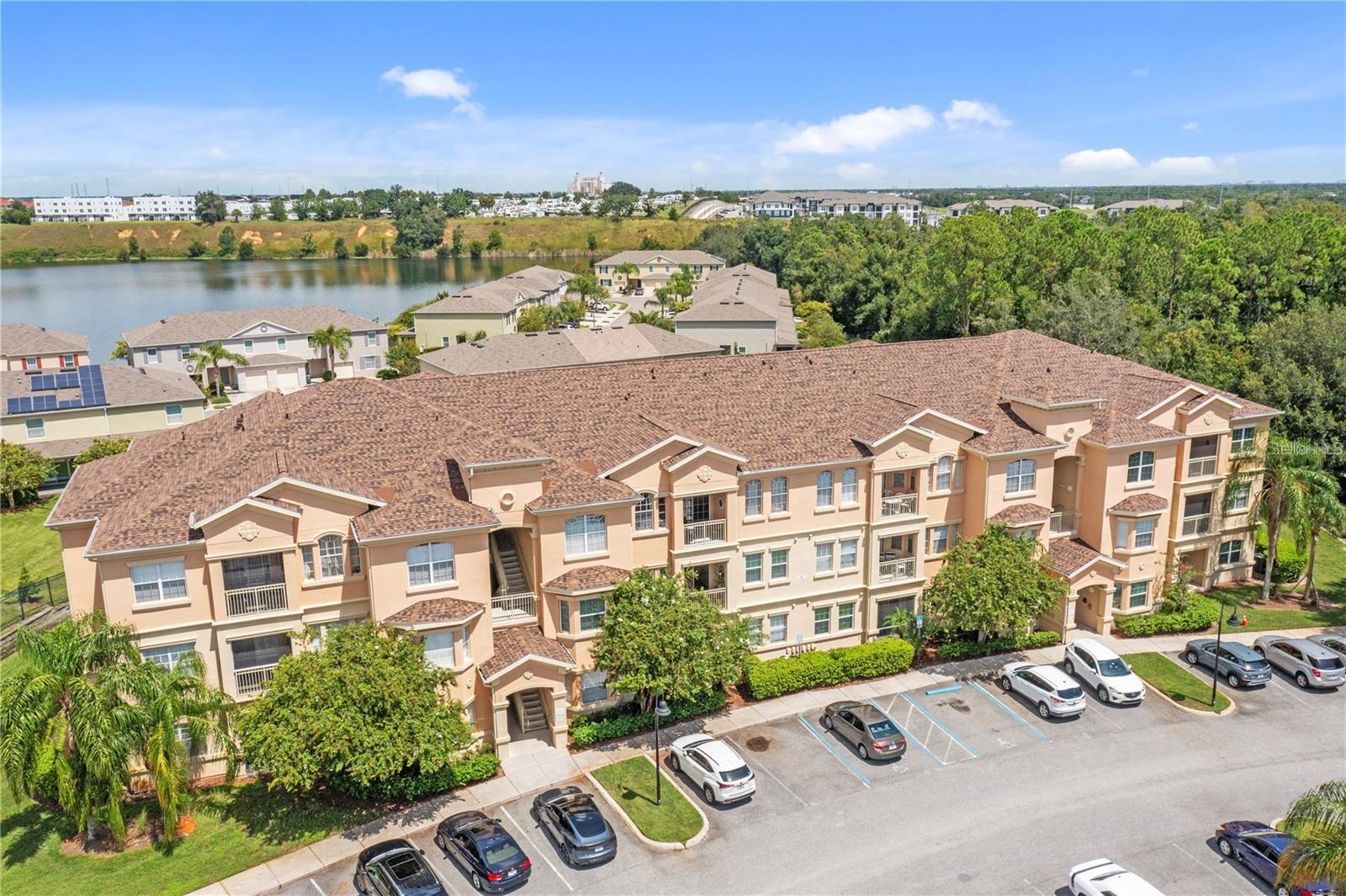 Welcome to this spacious 2 bedroom, 2 bathroom condo located in the sought-after gated community of Terrace Ridge in Davenport. This bright and open floor plan offers plenty of natural light and comfort, making it ideal as a primary home, vacation retreat, or investment property. Terrace Ridge features amenities including a clubhouse, community pool and spa, fitness center, and sand volleyball court. HOA fees include Frontier internet, water, sewer, and trash service so your only utility expense is electricity. Perfectly located just 20 minutes from Walt Disney World and close to other major Orlando attractions. You’ll also enjoy easy access and distance to I-4, ChampionsGate, Reunion Resort, shopping centers, and a wide variety of dining options. Experience low-maintenance living in a secure, gated community with everything Central Florida has to offer right at your doorstep.