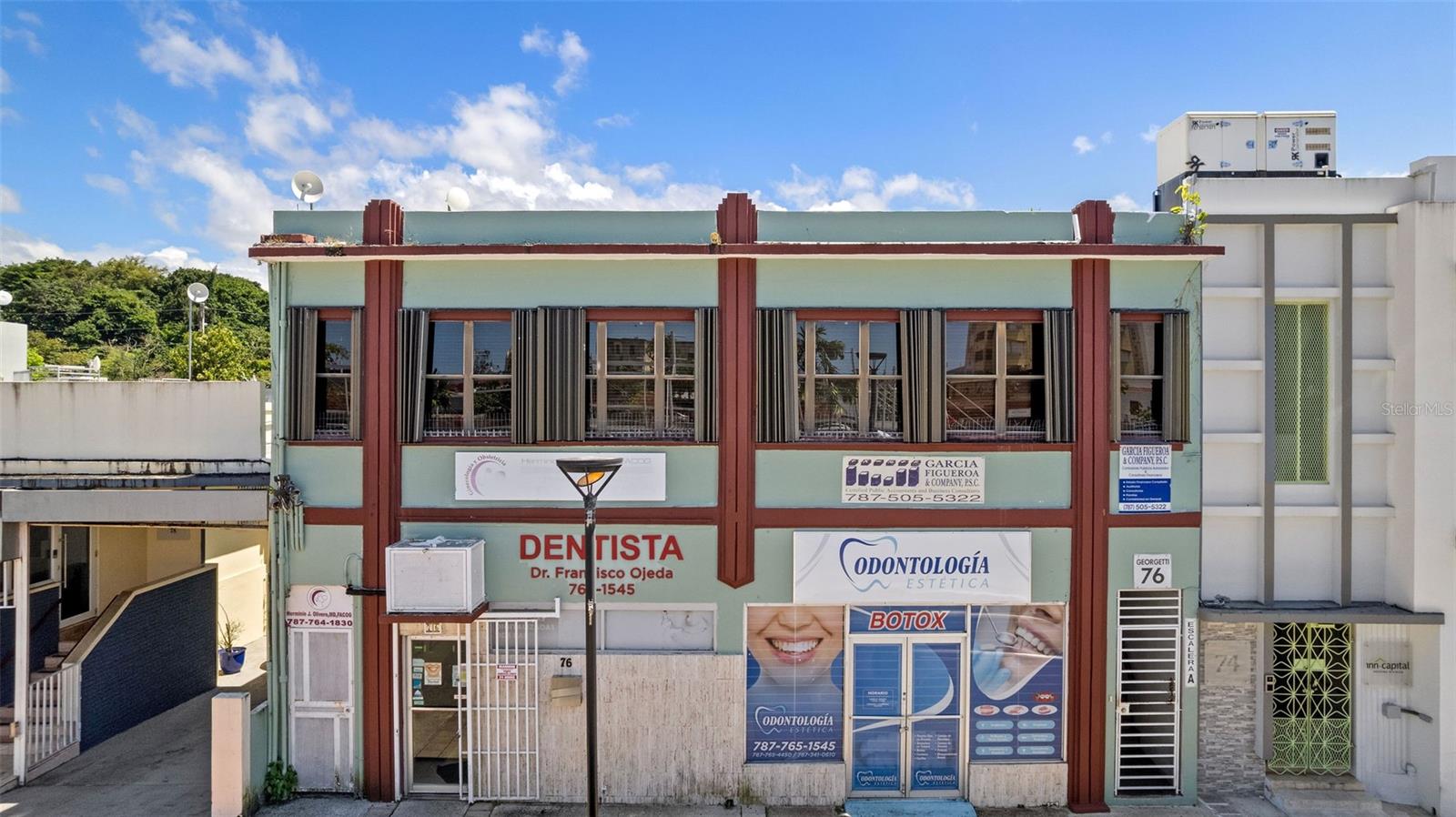 Prime Investment Opportunity situated in a high-traffic area in the heart of RÃo Piedras with excellent access to public transportation, public parking and nearby amenities, this building offers strong visibility and potential for income generation. With over 5,770 square feet of combined office space across two floors, this building is ideal for investors.
First Floor Highlights:
Office 1
Currently operating as a dental office, this space features a well-designed layout that includes a waiting room, reception area, office and work areas, x-ray room, closet space, one half bath, and an area equipped for dental chairs. Interior finishes include wood and glass doors, wood counters, and vinyl tile flooring.
Office 2
Previously used as a dental office and recently remodeled, this vacant unit offers a flexible layout with a waiting room, reception, records room, work area, storage addition, two half baths, and a dental chair room. Finishes include ceramic tile flooring, wood and metal doors, acoustic paneling, and gypsum board divisions.
Second Floor Highlights:
Office 3
Accessed via the left staircase, this office is currently rented and used as a medical space.
Office 4
Accessed via the left staircase, this unit offers additional office space with rental income potential.
Office 5
With exclusive access via the right staircase, this spacious unit includes a reception area and multiple office rooms. Features wood doors, gypsum board divisions, acoustic paneling, and ceramic tile floors. Currently rented and used as an accounting and legal office.
Office 5
A flexible unit with two office rooms and a reception area, finished with wood doors, gypsum board divisions, and native tile flooring.
Don’t miss out on this rare opportunity to own a centrally located commercial building. This building offers a great opportunity for medical and dental practices, health clinics, professional services, coworking spaces, or a multi-tenant investment property.