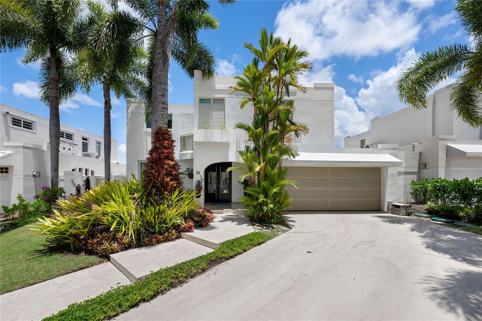 Welcome to this tranquil 2,995 square feet corner residence inside the exclusive gated community of Estancias Reales in Guaynabo.
This elegant four-bedroom, two-and-a-half-bathroom home is designed with top-of-the- line materials and appliances, featuring an extended family room and a spacious kitchen with custom hardwood cabinetry and stone countertops. Step outside to a marble-floored terrace with a custom bar and a stunning private pool, perfect for entertaining family and guests. Upstairs, the master suite offers a generous walk-in closet and a dual-sink bathroom, while the laundry room is conveniently located on the same level for easy access.
In addition to being available for purchase, the property is also offered for rent/lease at $7,900month for Long-term Lease.
Residents of Estancias Reales enjoy a wide range of amenities including a nature park, new dog park, resort-style pool with grill, a fully equipped gym, and courts for pickleball, tennis, and basketball.Tucked away in a low-traffic area yet only minutes from fine dining, high-end shopping, and top-rated schools, this home offers the perfect balance of luxury, comfort, and convenience. Schedule your private tour today and experience the lifestyle Estancias Reales and Guaynabo has to give.