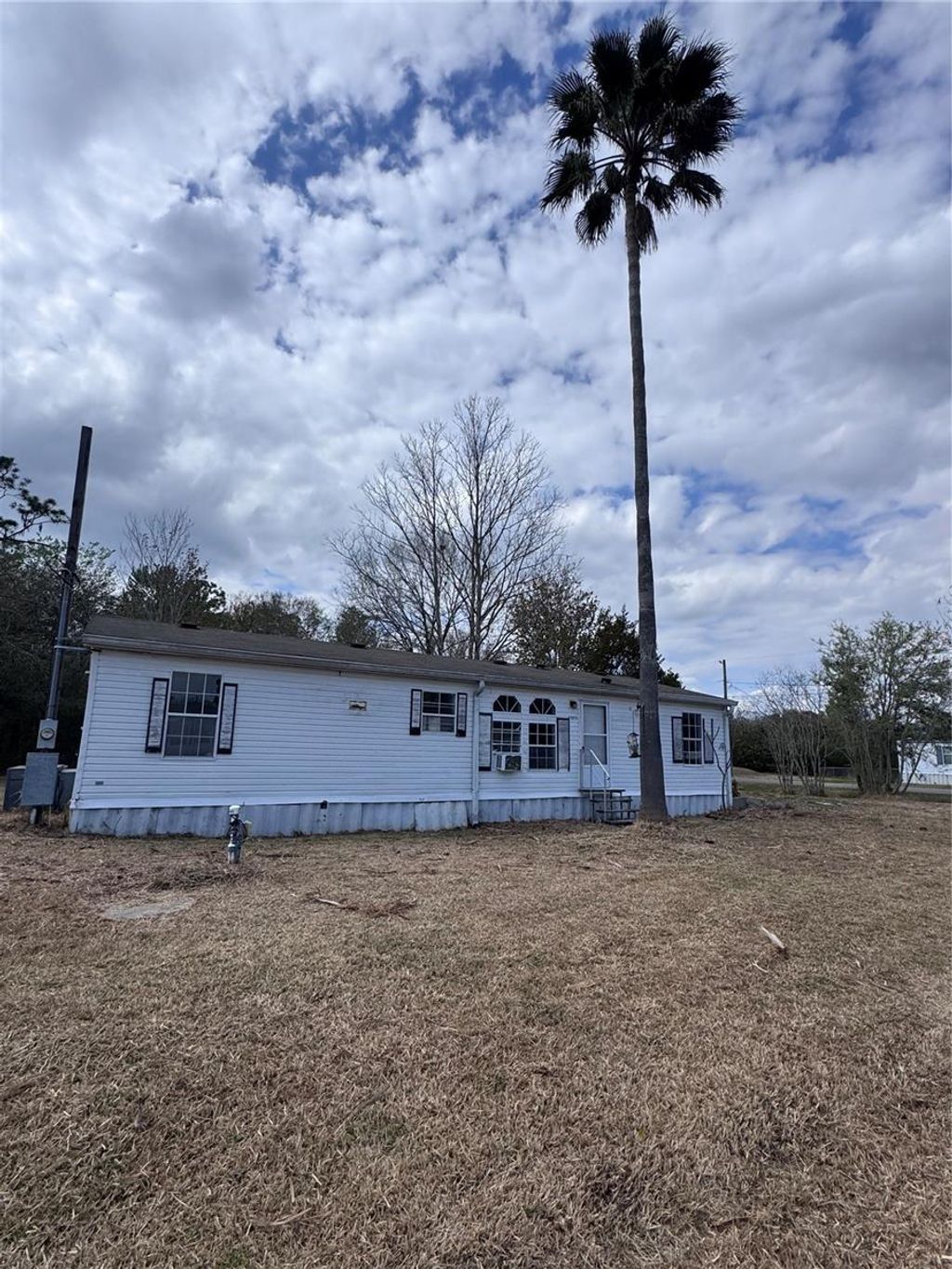 Photo of 4905 Herndon Drive, Auburndale, FL 33823 (MLS # S5145110)