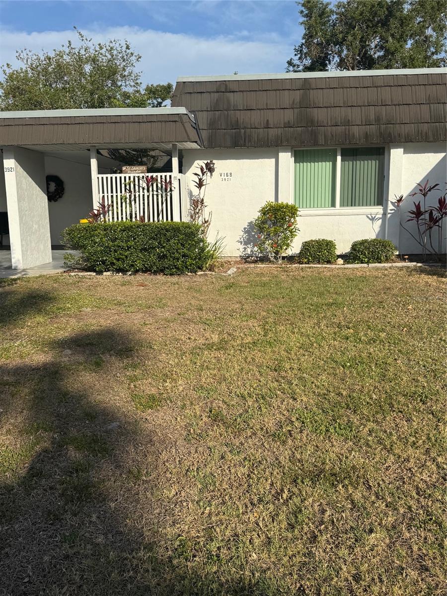 ROCK BOTTOM !!!! Welcome to your next chapter at 3921 Lakeside Road in sunny Sarasota! PRICED TO SELL!! Nestled in a vibrant 55+ community, this 2-bedroom, 2-bath villa offers incredible potential and a great opportunity to add your personal touch. The home is clean and well-maintained, featuring covered carport parking and a separate laundry and storage room. Enjoy a low-maintenance lifestyle with affordable fees that include water and cable. The community boasts fantastic amenities such as a sparkling pool, clubhouse, workout room, shuffleboard court, and an active social calendar. Located just a short distance from the beautifully restored Bobby Jones Golf Course, you’ll love the convenience of nearby recreation, shopping, and dining. Available for immediate occupancy—SELLER IS MOTIVATED! Make this charming villa your own! All information provided by the sellers is deemed reliable but is not guaranteed. Buyers are encouraged to verify all information independently.