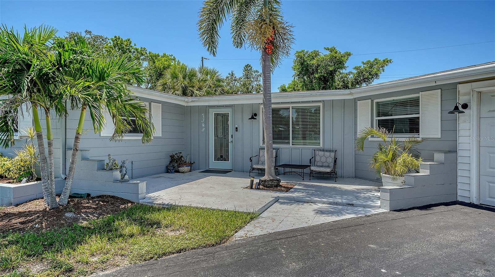 This turnkey-furnished, three-bedroom, two-bathroom caged pool home with a study/den/office, and a one-stall garage is three blocks from Sarasota Bay in Whitfield Estates. The current owners have used it as a vacation home and have also rented it for the past four years, averaging $20,000 each year in rental income. They do have a rental booked for February and March of 2026 for $12,000 total. You, as the new owner can accept this lease and the rental income or please notify us that you do NOT want it, and we will cancel the lease for you. Built in 1962 with an effective date of 1990 from previous owner's renovations, it has a seven-year young roof, a four-year young HVAC system, the caged pool which has a four-year young solar pool heater, the flooring and baseboards are three-years young and the refrigerator and dishwasher are two-years young. The hot water heater is three-years young, and the house has all newer vinyl windows and sliding glass doors, which were done four years ago. The pool area is caged and the entire rear yard area is WHT PVC fenced with two privacy gates. There is ample driveway parking space, plus a parking pad next to the one-stall garage, and also on-street parking, There is also a 11 x 11 non-HVAC storage room attached to the home behind the side patio. The Primary Suite has dual sinks, a jet-tub and shower combo, and a walk-in closet. Both the other two bedrooms have built in closets, and the second bathroom has a tub/shower combination. The second bedroom has sliding glass doors out to the side yard of this one-third acre estate property. Whitfield Estates has no homeowner's association or association fees and this is not a deed-restricted neighborhood. It does adhere to Manatee County rules and regulations, concerning leasing and pets. Flood insurance is not required. Homeowner and wind insurance is $4,400 annually. Monthly utility and maintenance costs are on average: FPL is $250. Manatee County water, sewer, trash, recycling is $200 to $300 depending on the pool. Pool care is $135 and lawn care is $100.