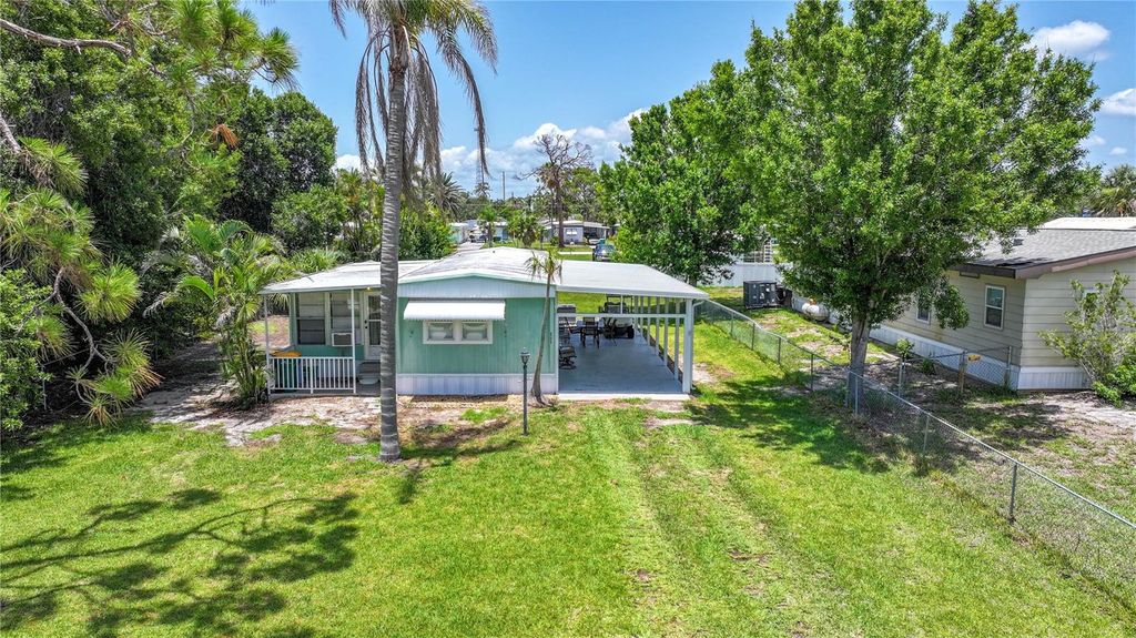 Photo of 8224 Pinetree Lane, Englewood, FL 34224 (MLS # D6142700)