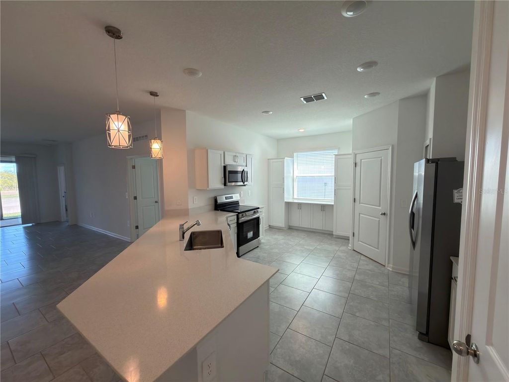 Photo of 521 Reggie Road, Winter Haven, FL 33884 (MLS # L4960535)