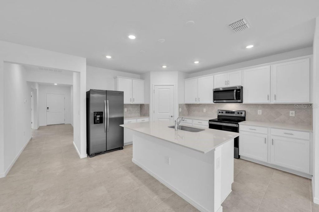 Photo of 11775 Moonsail Drive, Parrish, FL 34219 (MLS # TB8434905)