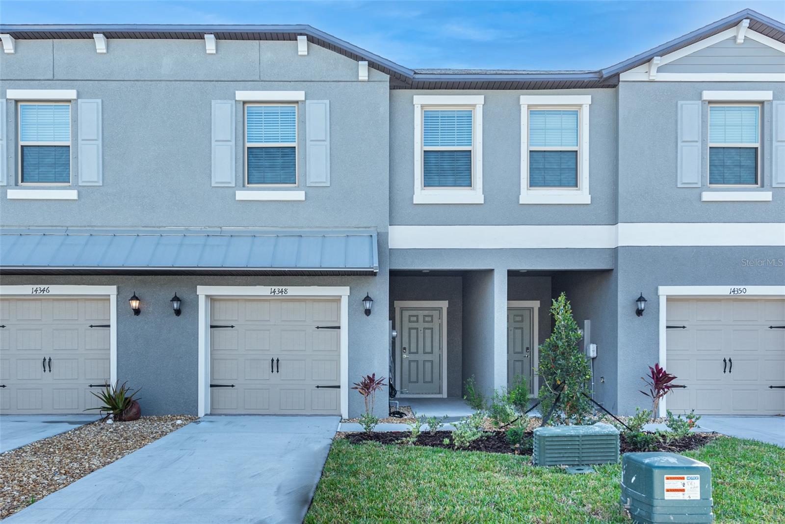 This must-see luxury townhouse with 3 bedrooms and 2.5 bathrooms is located in a gated section of Belmont, alongside Route 301 near I-75 (Apollo Beach exit or Sun City exit). The front entryway opens into a large living and dining room combination with nice tall ceilings. The well-appointed kitchen features rich espresso cabinets, granite counters, stainless steel GE appliances, drinking water filtration system and recessed lighting. The screened lanai off the kitchen is a lovely outdoor area. Upstairs leads to a flexible loft space, 2 secondary bedrooms and a laundry closet with washer and dryer included. The primary bedroom suite is generous in size with a walk-in closet and an ensuite bathroom with a walk-in shower. High speed Internet service options provided by either Spectrum or Frontier. The association dues are paid by the landlord covering water/sewer and trash pickup, lawn care and sprinklers, access to community amenities such as pool, tennis courts, playground and clubhouse and you enjoy the peace of mind in living in a gated community. Belmont is centrally located in Ruskin (Sun City Center) near Riverview’s Big Bend Road shopping facilities including Sam’s Club, Walmart, Winn-Dixie supermarkets, and a variety of restaurants, and a Publix is right in the community’s next door plaza within walking distance. St. Joseph’s Hospital is nearby, right off 1-75 at Apollo Beach exit. The application fee is $80 per person 18 and over. Deposit is due upon approval. A tenant processing fee of $125.00 will be due at move-in, in addition to rent.