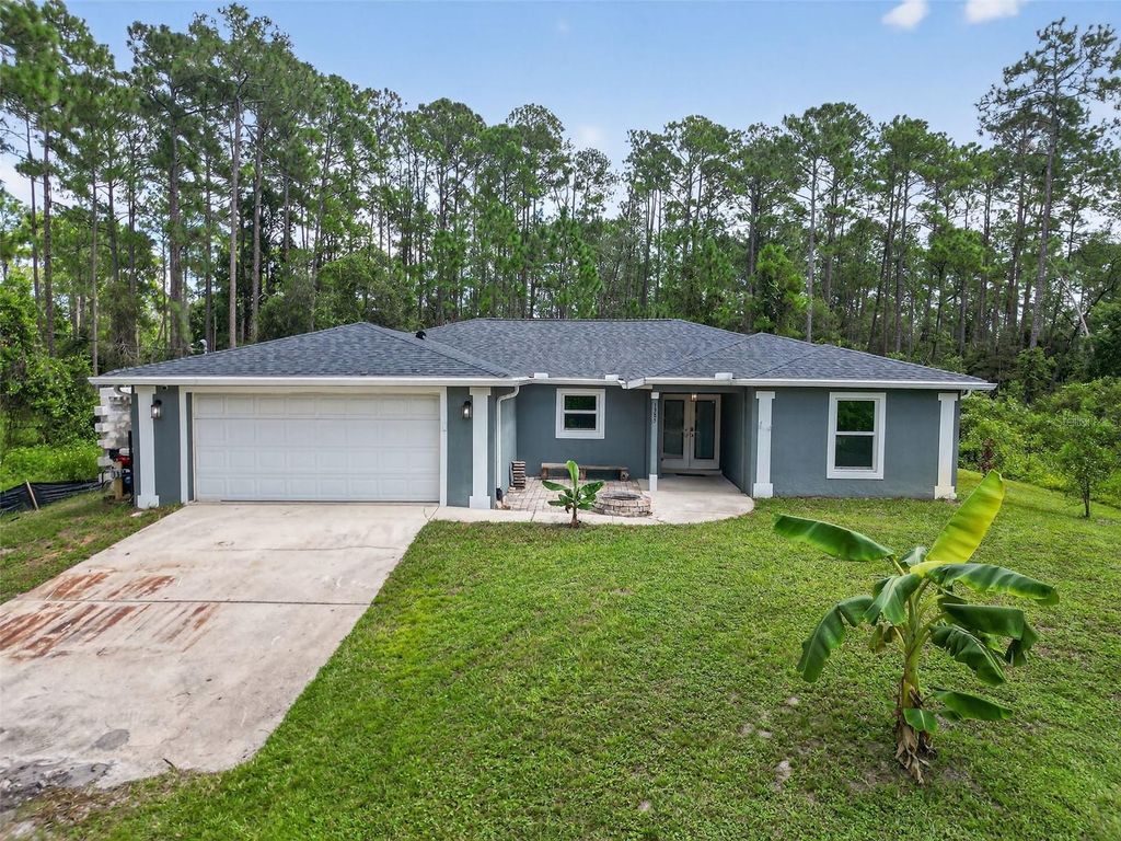 Photo of 1385 11th Avenue, Deland, FL 32724 (MLS # V4948939)