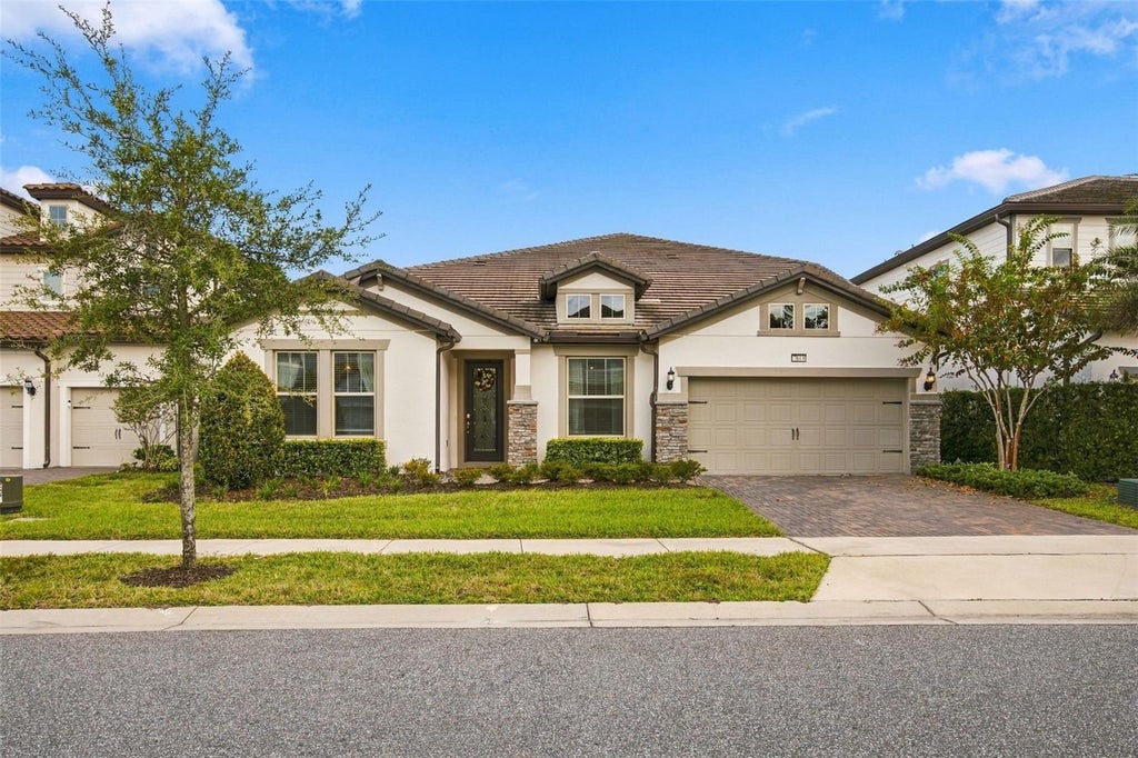 Photo of 7643 Wandering Way, Orlando, FL 32836 (MLS # O6446078)