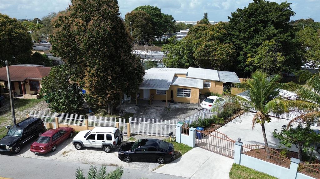 Photo of 9590 NW 33rd Avenue, Miami, FL 33147 (MLS # TB8485440)