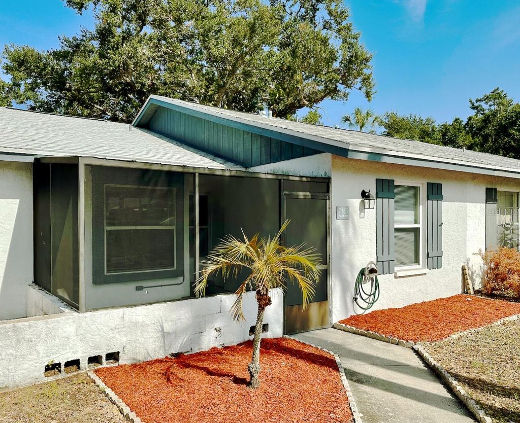 Photo of 7135 Parkside Villas Drive N, St Petersburg, FL 33709 (MLS # TB8451330)