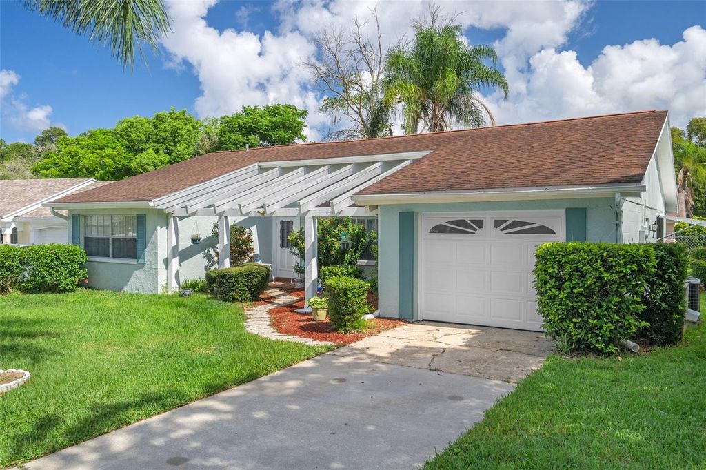 Photo of 8021 Wildflower Row, Hudson, FL 34667 (MLS # W7875416)