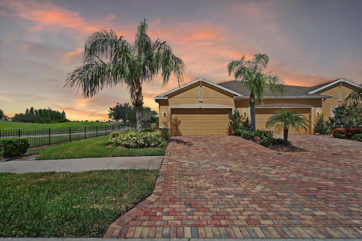Don't Let High Interest Rates Hold You Back—THIS HOME HAS A RARE 2.25% ASSUMABLE LOAN! You'll never find an interest rate this low again. With a $300,000 loan at 2.25% interest, you'll save over $850/month compared to today's average rates. That’s real buying power—and a rare opportunity in one of Florida's most sought-after maintenance-free retirement communities. Welcome to Verona at Renaissance, in Sun City Center, a prestigious gated enclave within one of Florida’s top-rated 55+ communities. This impeccable 3-bedroom, 2-bath Buttonwood villa sits on a premium golf course lot, tucked away on the last homesite in the neighborhood, offering unrivaled privacy, panoramic views, and breathtaking sunrises and sunsets. Step inside and feel the difference, owner pride and meticulous care are evident throughout. This home is better than new, featuring luxury upgrades such as, custom plantation shutters & Hunter Douglas blinds. Hurricane shutters for your peace of mind. Designer ceiling fans & tray ceilings. Recessed & under-cabinet lighting. A gourmet kitchen with granite counters, 42” cabinets w/crown molding, stylish backsplash, and a breakfast bar. Enjoy open concept living with elegant architectural touches and a seamless flow that’s perfect for both relaxing and entertaining. MOST OF THE FABULOUS FURNISHINGs & GORGEOUS DECOR ARE AVAILABLE SEPERATELY, making this amazing home even easier to move right into. Two large wall-mounted TVs will remain with the home. Outside, you'll be welcomed by lush tropical landscaping, a paver driveway and walkway and one of the largest premium lots in all of Verona, adding to the home’s incredible curb appeal and privacy. This is resort-style living at its finest. As a resident of Verona, you’ll enjoy a maintenance-free lifestyle (HOA includes lawn care, exterior maintenance, roof, and gated security). Private access to Renaissance's Golf & Country Club and their 5-star restaurant and bar. Access to four pools, state-of-the-art fitness centers with personal trainers, a luxurious spa, an indoor walking track, and 3 spectacular clubhouses. The very best medical care, a hospital and free paramedic & ambulatory services, shopping, multiple golf courses, and over 200 clubs and activities are all golf-cart accessible in Sun City Center's self-contained community! With 350 days of sunshine every year, only minutes from several world-class beaches, and Disney is just a short drive. Sun City Center is Florida's best-kept secret for active adults. This is more than a home—it’s a lifestyle upgrade. And with a 2.25% assumable mortgage, it’s a deal that won’t last. Schedule your showing today and claim your piece of paradise!