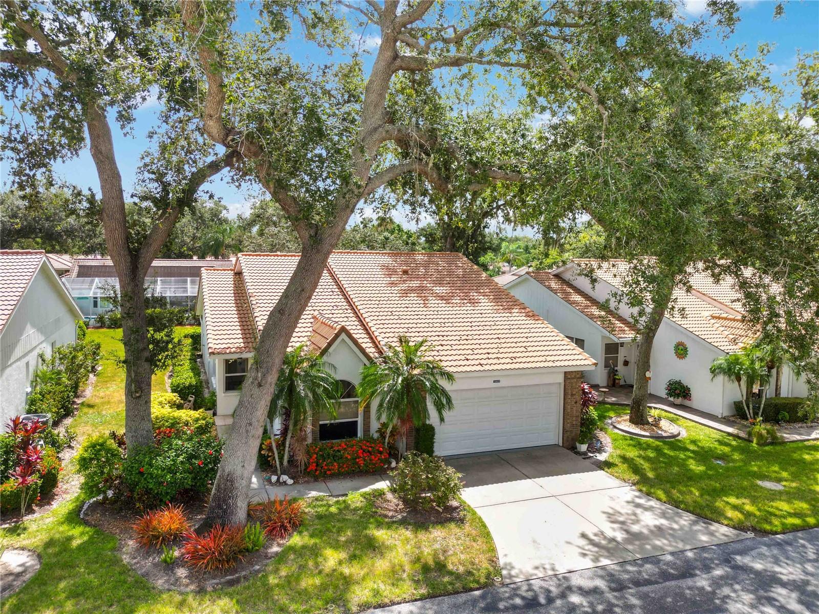 This is the one * BEST VALUE & BEST CONDITION * IT'S IMMACULATE, UPDATED & MAINTENANCE-FREE * Meticulously maintained * Fabulous 55+ Community * NEW TILE ROOF 2017 * NEW A/C 2017 * This home has been LOVINGLY RENOVATED with a NEW CHEF'S KITCHEN WHICH IS NOW OPEN TO THE LIVING ROOM * NEW CUSTOM KITCHEN CABINETS, NEW QUARTZ COUNTERTOPS, DOUBLE OVEN, CENTER ISLAND, SEPARATE REFRIGERTAOR & FREEZER * This is a very open & modern floor plan * Vaulted Ceilings * NEW Flooring * Split Plan * 3 Bedrooms & 2 Baths * 2 Car Garage * OVERSIZED Lanai * Primary Suite features a walk-in closet and UPDATED Bath * This home shows LIGHT & BRIGHT with an ABUNDANCE OF NATURAL LIGHT * The perfect home for entertaining or simply relaxing in your slice of paradise * This home is the BEST VALUE IN GARDEN LAKES * Run, don't walk to this GREAT BUY *
Garden Lakes is a maintenance-free community with exceptional amenities, including a heated pool, updated clubhouse with a full kitchen, fitness center, library, pickleball, tennis, shuffleboard, and walking trails. Enjoy an active social calendar with events, classes, and gatherings to connect with friendly neighbors. Conveniently located near outstanding shopping, dining, medical facilities, and cultural attractions, this home is your gateway to carefree Florida living. There's so much to do nearby0 including University Town Center mall area, Sarasota's art and entertainment venues, and of course the beautiful white-sand Gulf beaches. ONE LOOK & YOU'LL FALL IN LOVE *