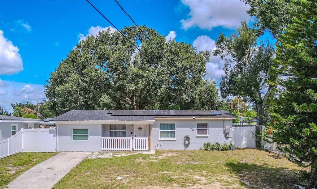 Photo of 4210 E Sandalwood Circle S, Tampa, FL 33617 (MLS # TB8476015)