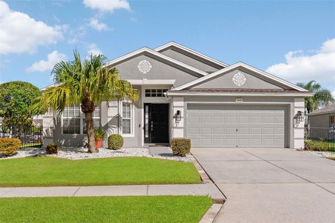 Photo of 7619 Crescent Palm Drive, Wesley Chapel, FL 33545 (MLS # TB8501900)
